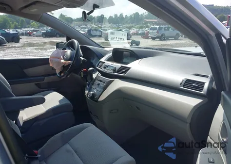 2012 Honda Odyssey Lx z USA, uszkodzony, nr VIN 5FNRL5H21CB012648